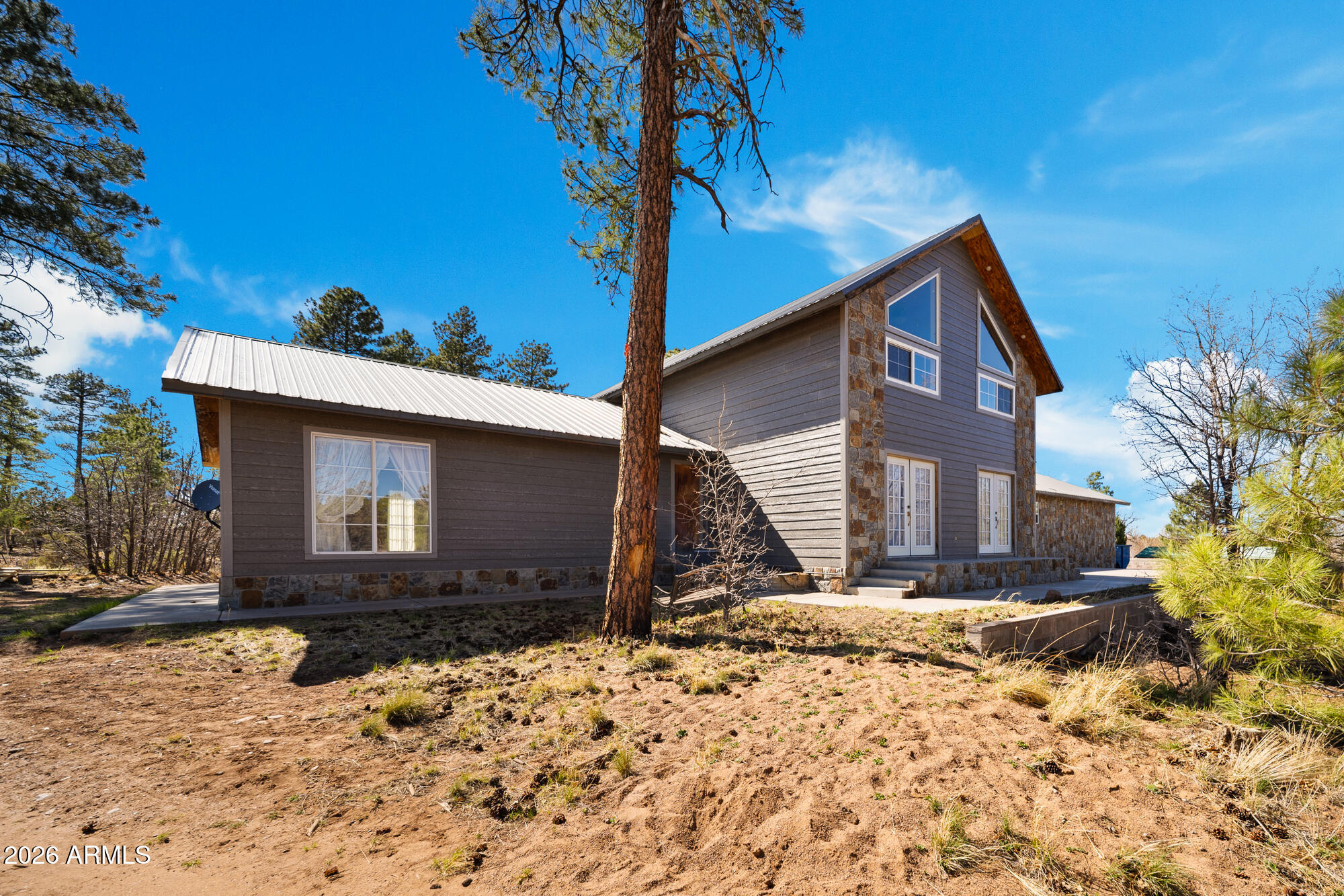 1234 Turkey Hill Road Pinedale, AZ 85934 - Photo 2 of 48 a front view of a house with a yard