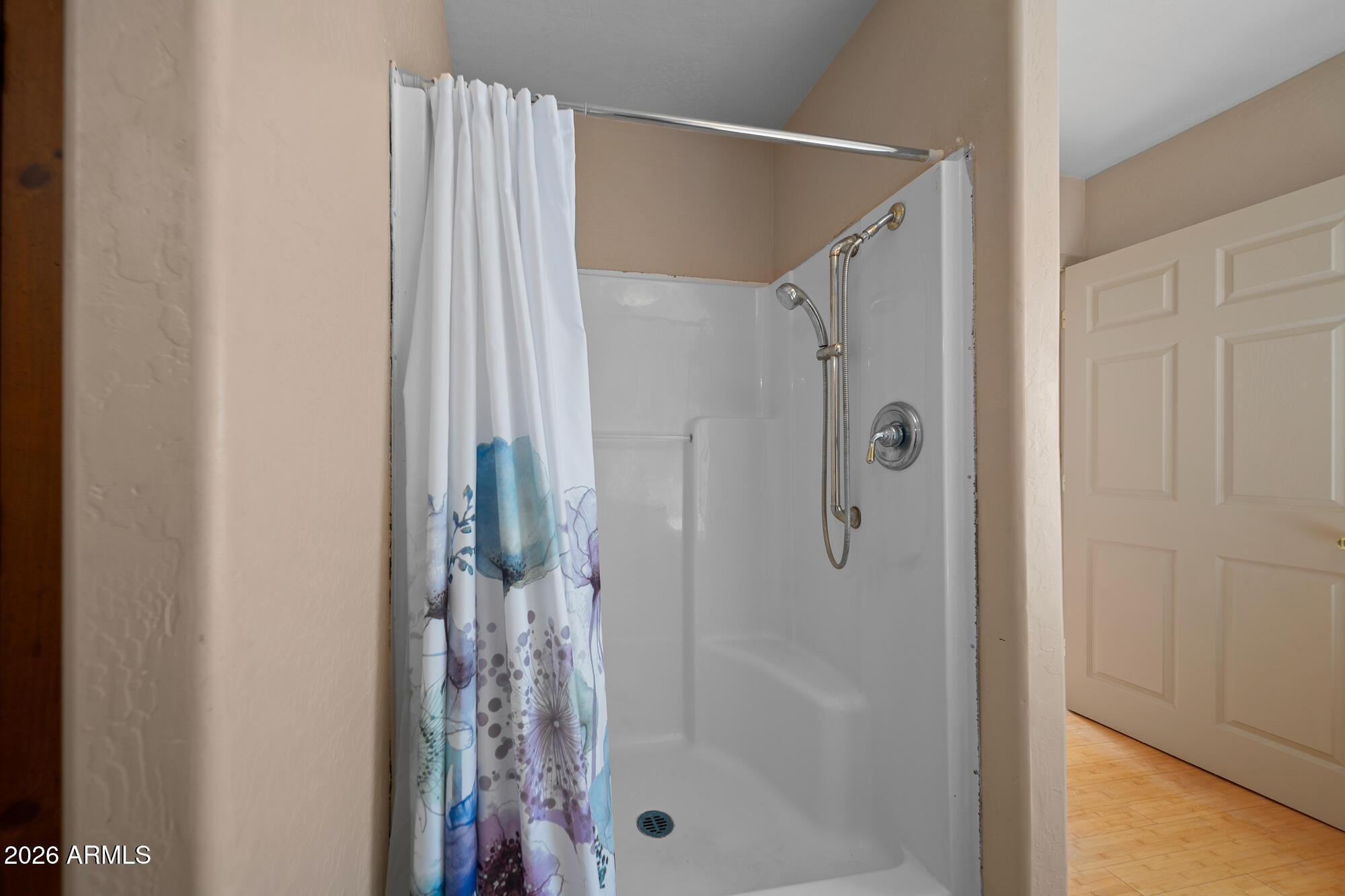 1234 Turkey Hill Road Pinedale, AZ 85934 - Photo 26 of 48 a bathroom with a glass shower door