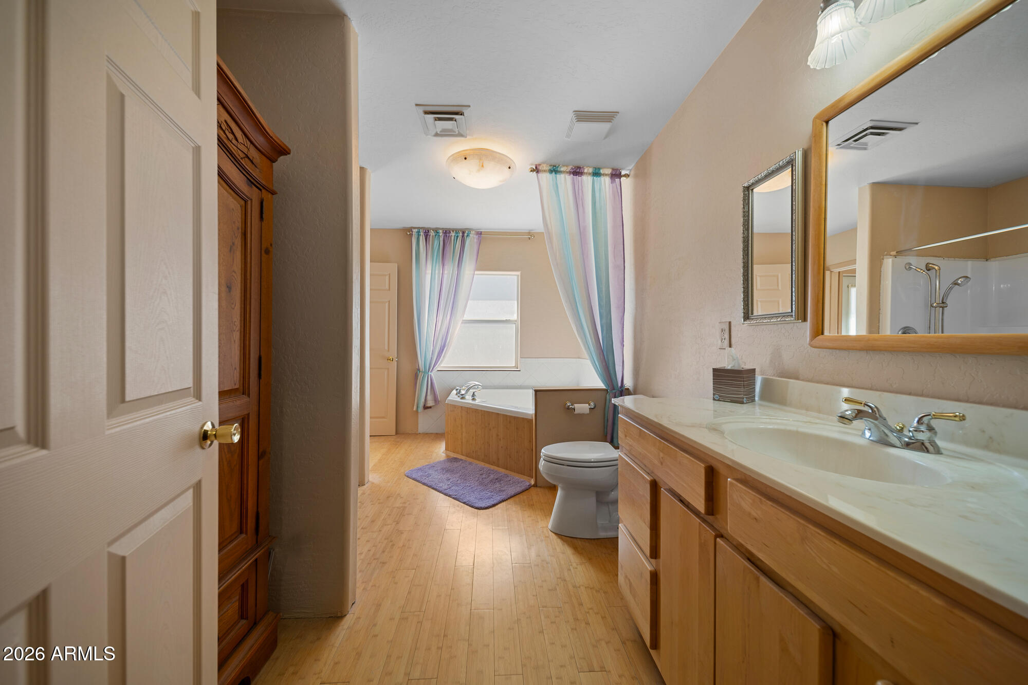 1234 Turkey Hill Road Pinedale, AZ 85934 - Photo 27 of 48 a bathroom with a sink a toilet a tub and a window