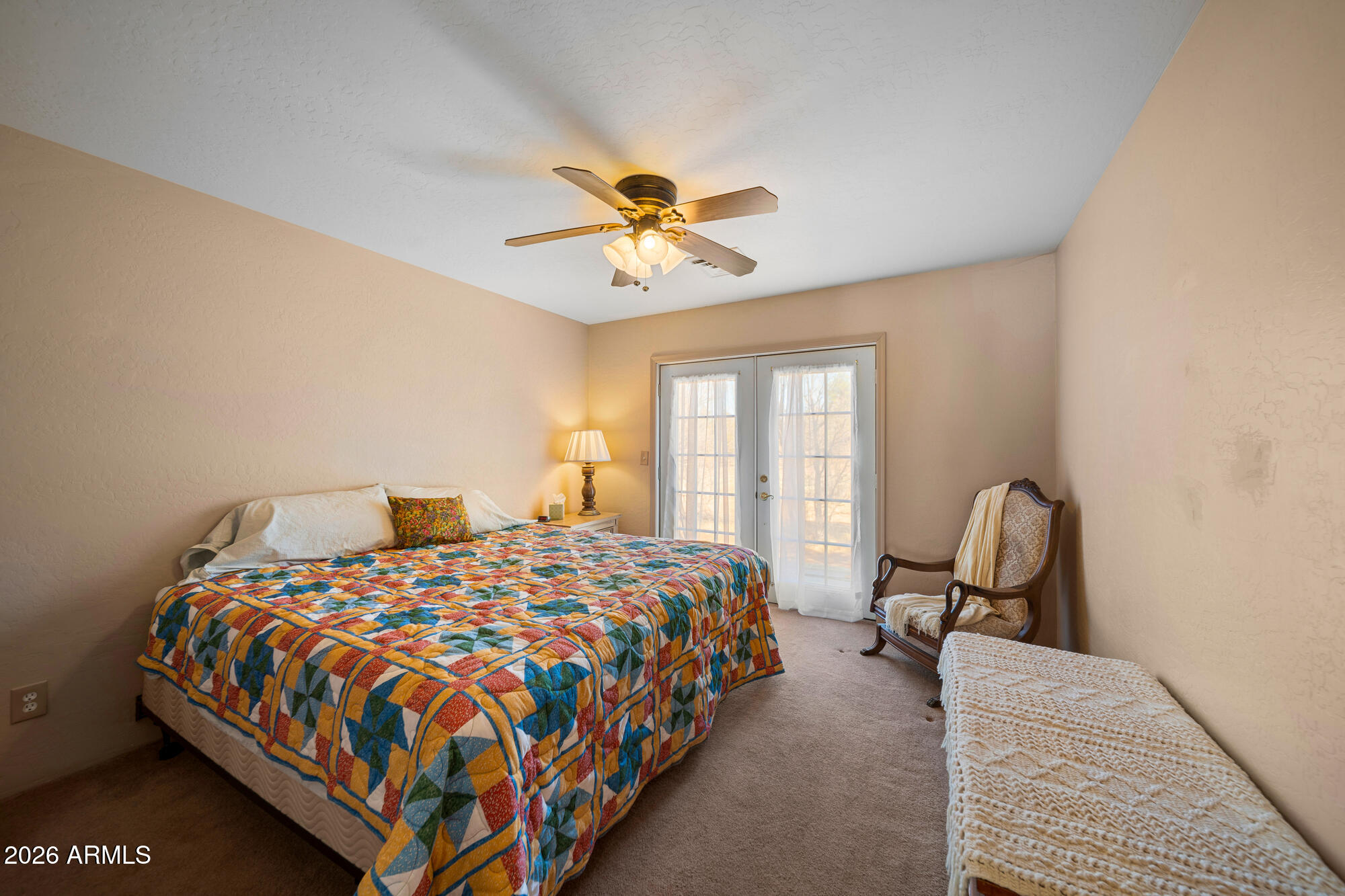 1234 Turkey Hill Road Pinedale, AZ 85934 - Photo 28 of 48 a bedroom with a bed chairs and a window