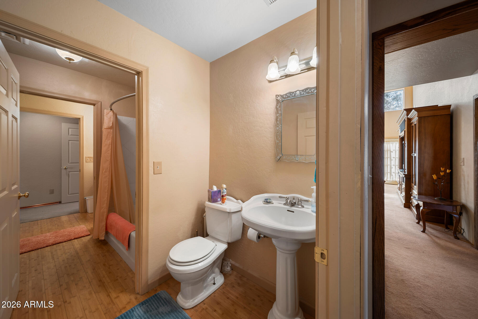 1234 Turkey Hill Road Pinedale, AZ 85934 - Photo 29 of 48 a white toilet sitting next to a bathroom sink