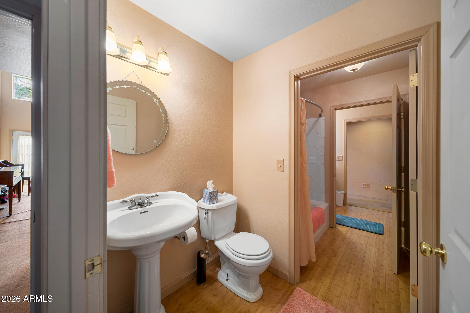 1234 Turkey Hill Road Pinedale, AZ 85934 - Photo 31 of 48 a bathroom with a toilet sink and mirror