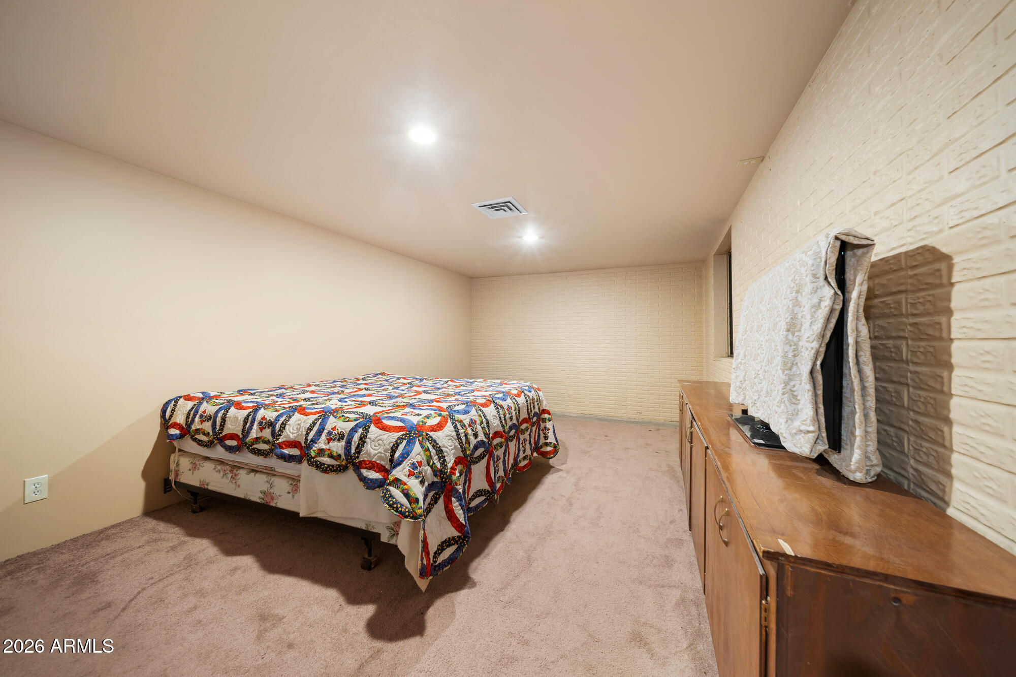 1234 Turkey Hill Road Pinedale, AZ 85934 - Photo 35 of 48 a bedroom with a bed and a flat screen tv