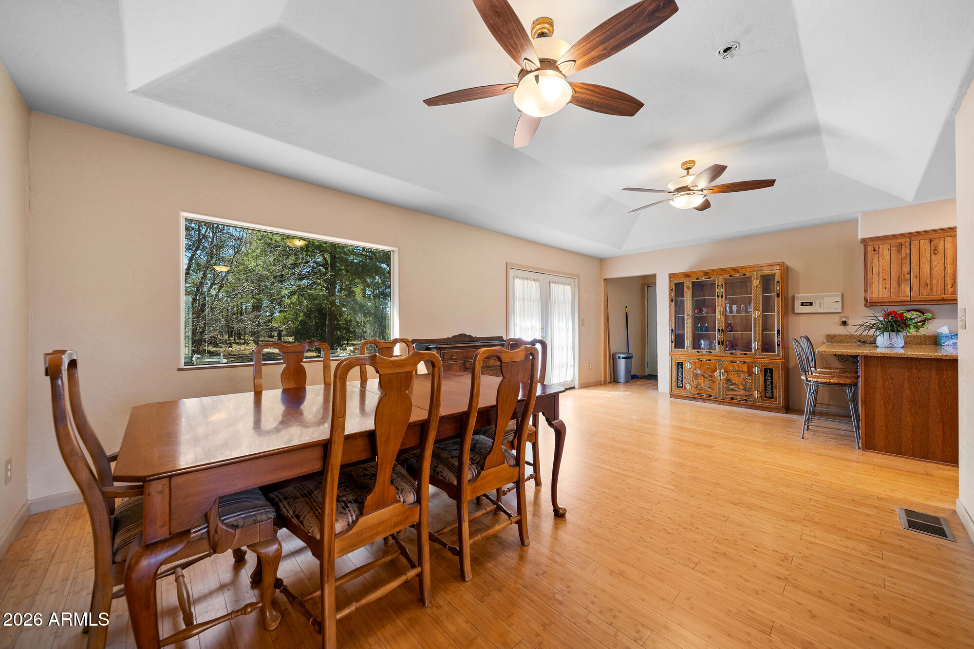 1234 Turkey Hill Road Pinedale, AZ 85934 - Photo 8 of 48 a view of a dining room with furniture window and wooden floor