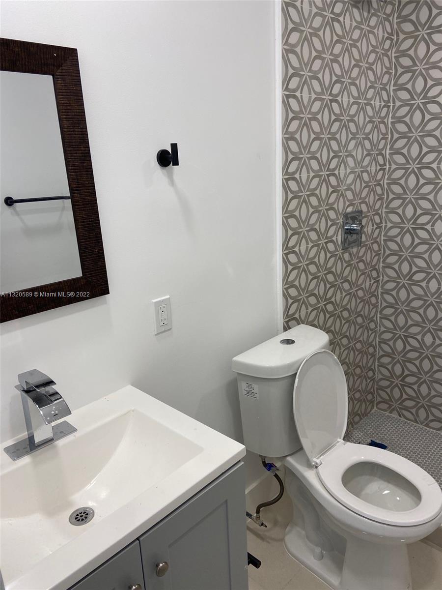 Biscayne Gardens Miami, FL 33169 - Photo 16 of 18 a bathroom with a sink and a toilet