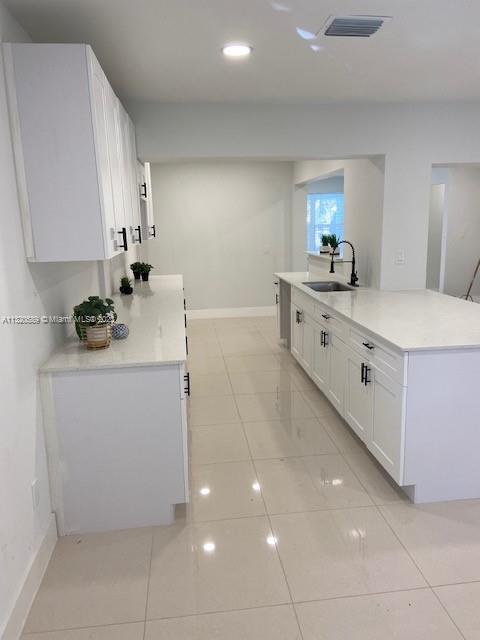 Biscayne Gardens Miami, FL 33169 - Photo 18 of 18 a kitchen with a sink cabinets and window
