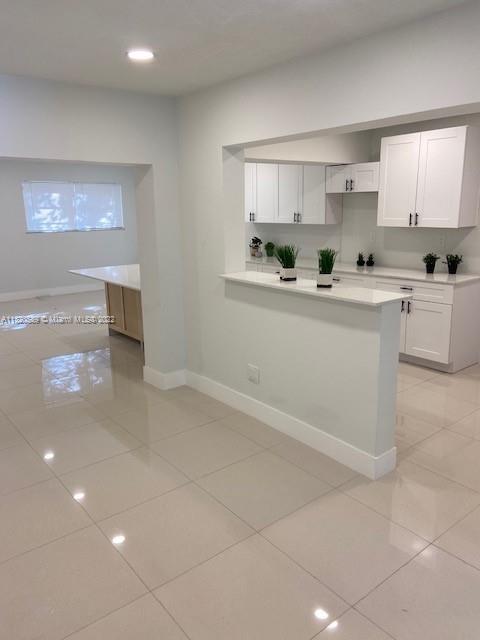 Biscayne Gardens Miami, FL 33169 - Photo 9 of 18 a kitchen with a sink cabinets and window