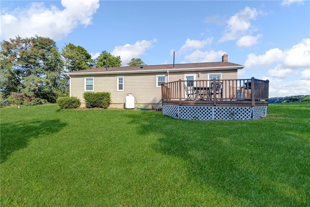180 Swearingen Road Georgetown, PA 15043 - Photo 3 of 20 a view of a house with a yard and deck