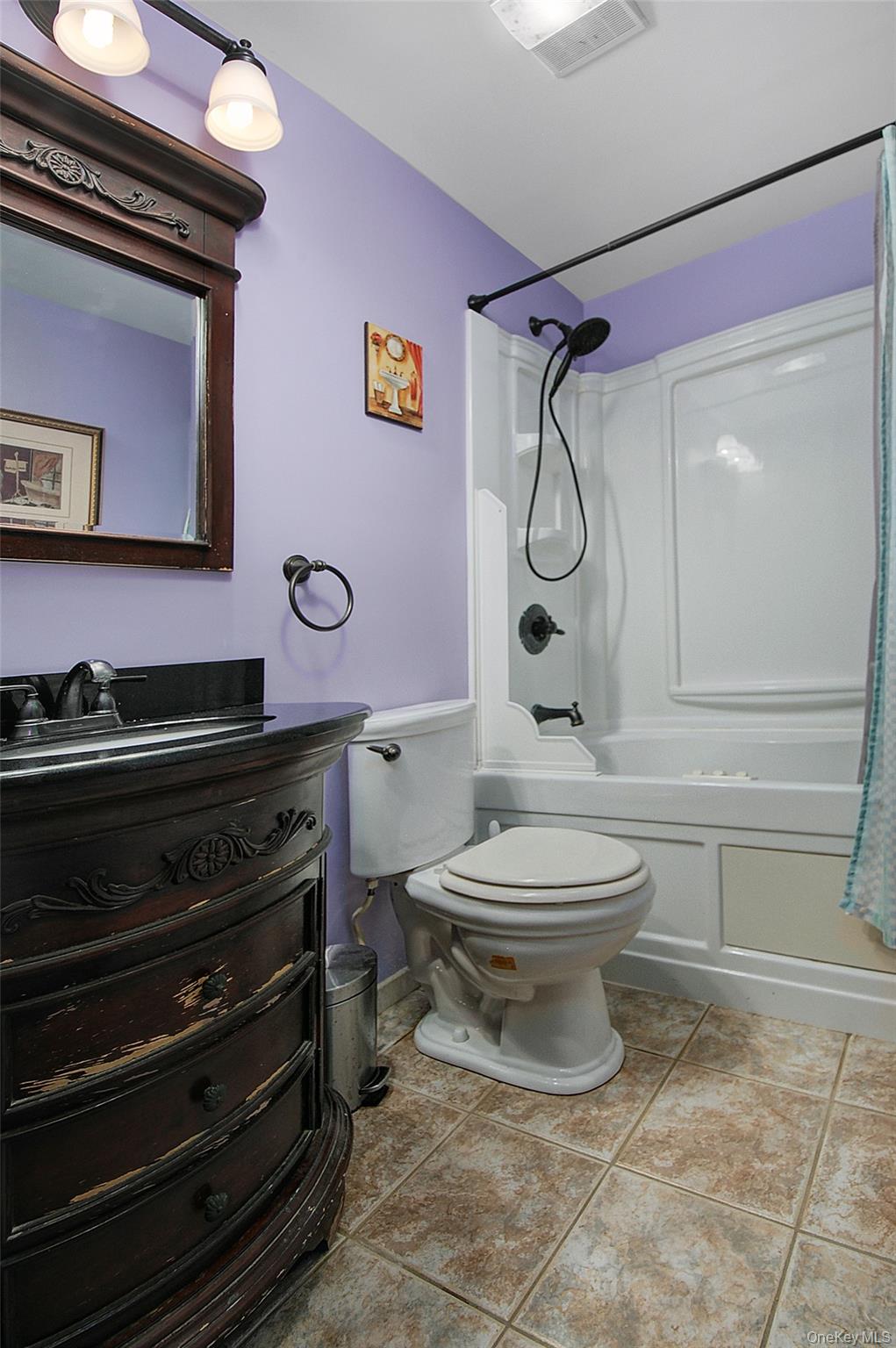 554 High Street Monroe, NY 10950 - Photo 24 of 29 a bathroom with a toilet a sink and shower