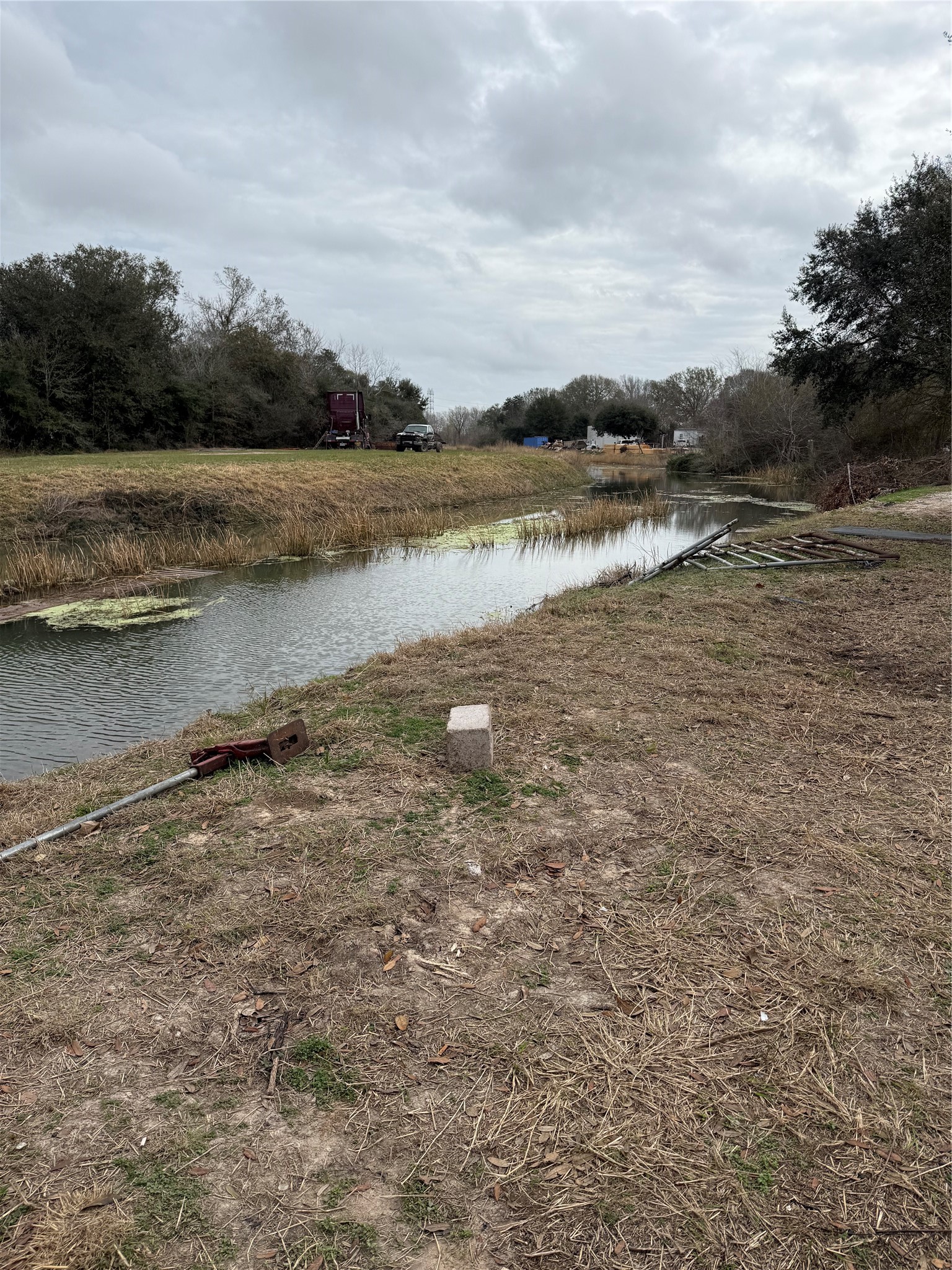 815 Jasmine Street Fresno, TX 77545 - Photo 5 of 11 a view of a lake with houses in background