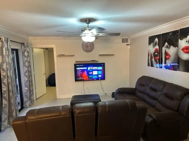 a bathroom with a shower and a sink