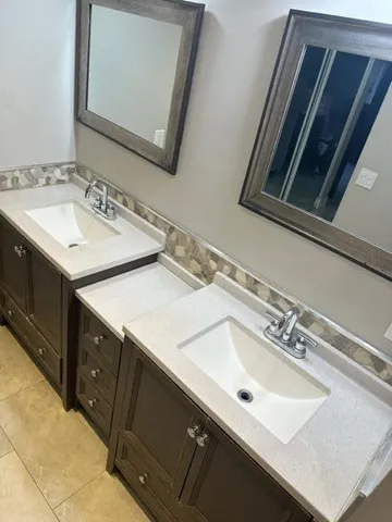 a view of a garden with a bench in a garden