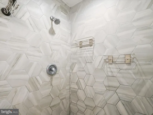 a view of a room with wooden floor and sink