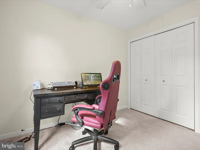 a view of an empty room with stairs