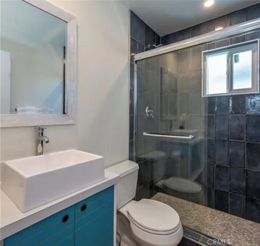 a swimming pool with outdoor seating and yard