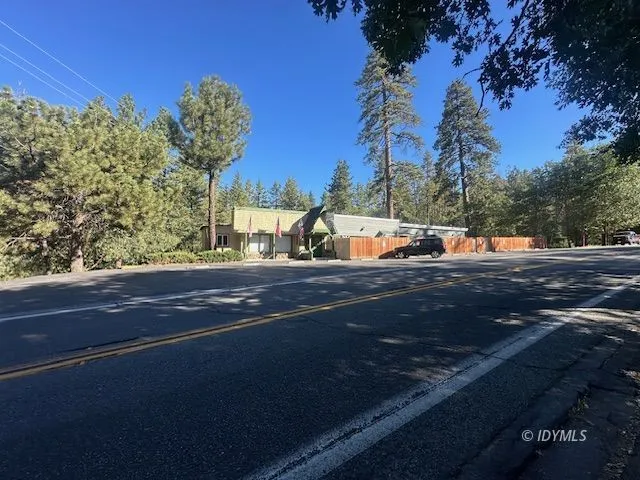 a view of a street with some trees