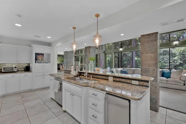 an aerial view of a house with outdoor space