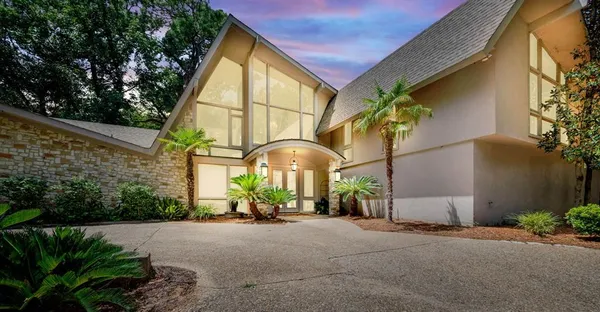 a house view with a garden space