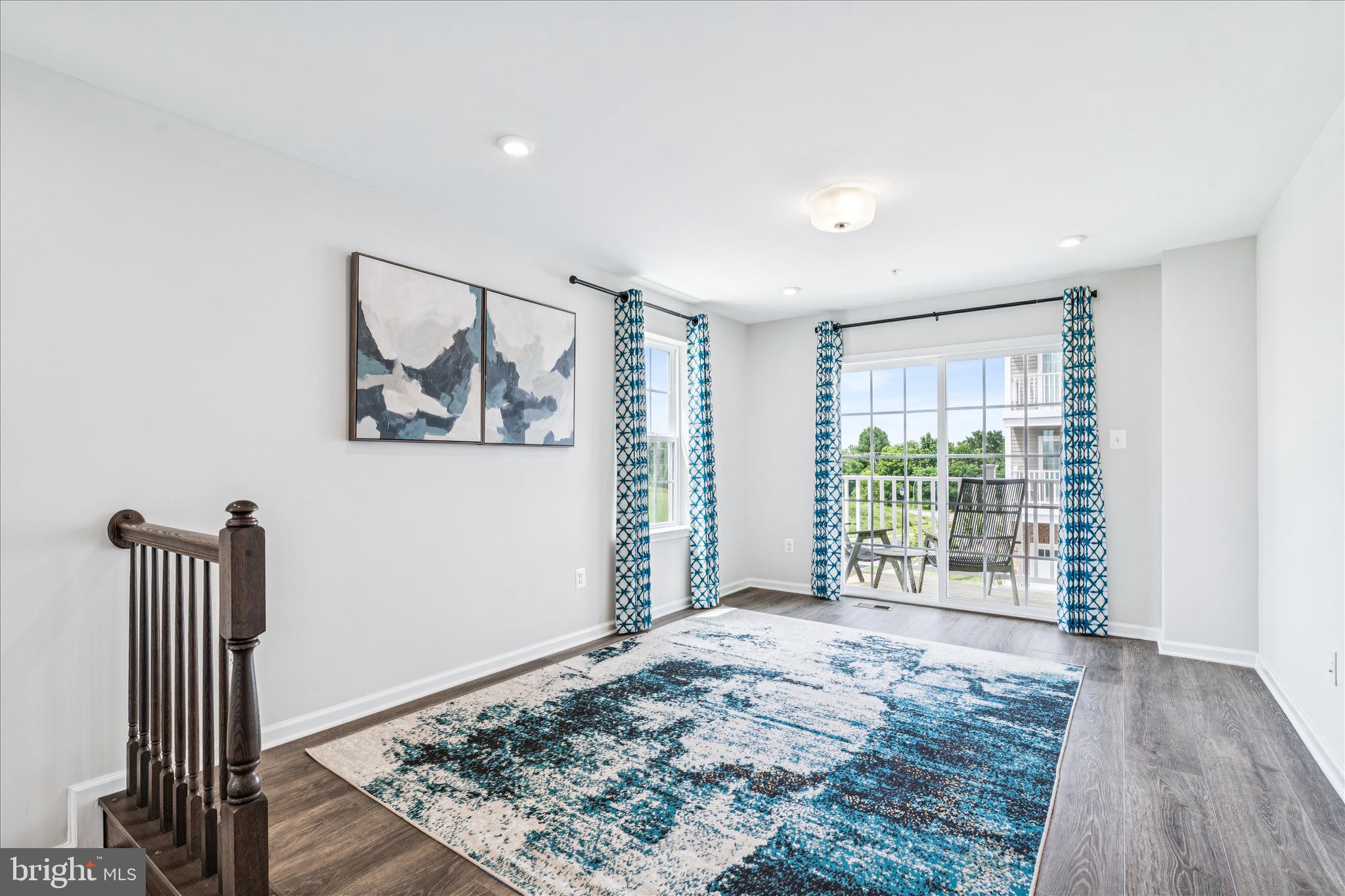9454 James Macgowan Lane, Unit 447 Owings Mills, MD 21117 - Photo 13 of 41 a view of livingroom with furniture and window