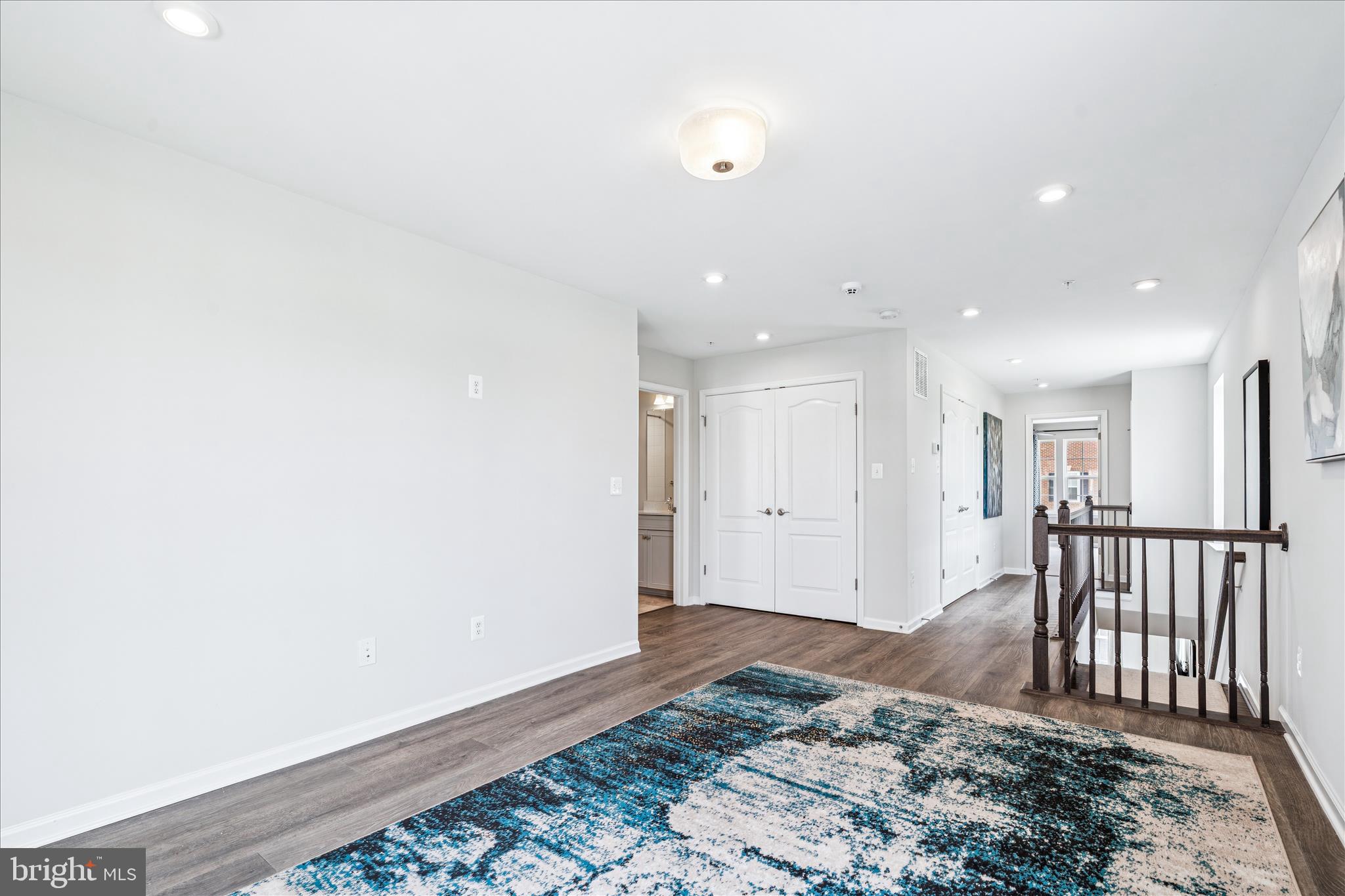 9454 James Macgowan Lane, Unit 447 Owings Mills, MD 21117 - Photo 14 of 41 a view of a hallway