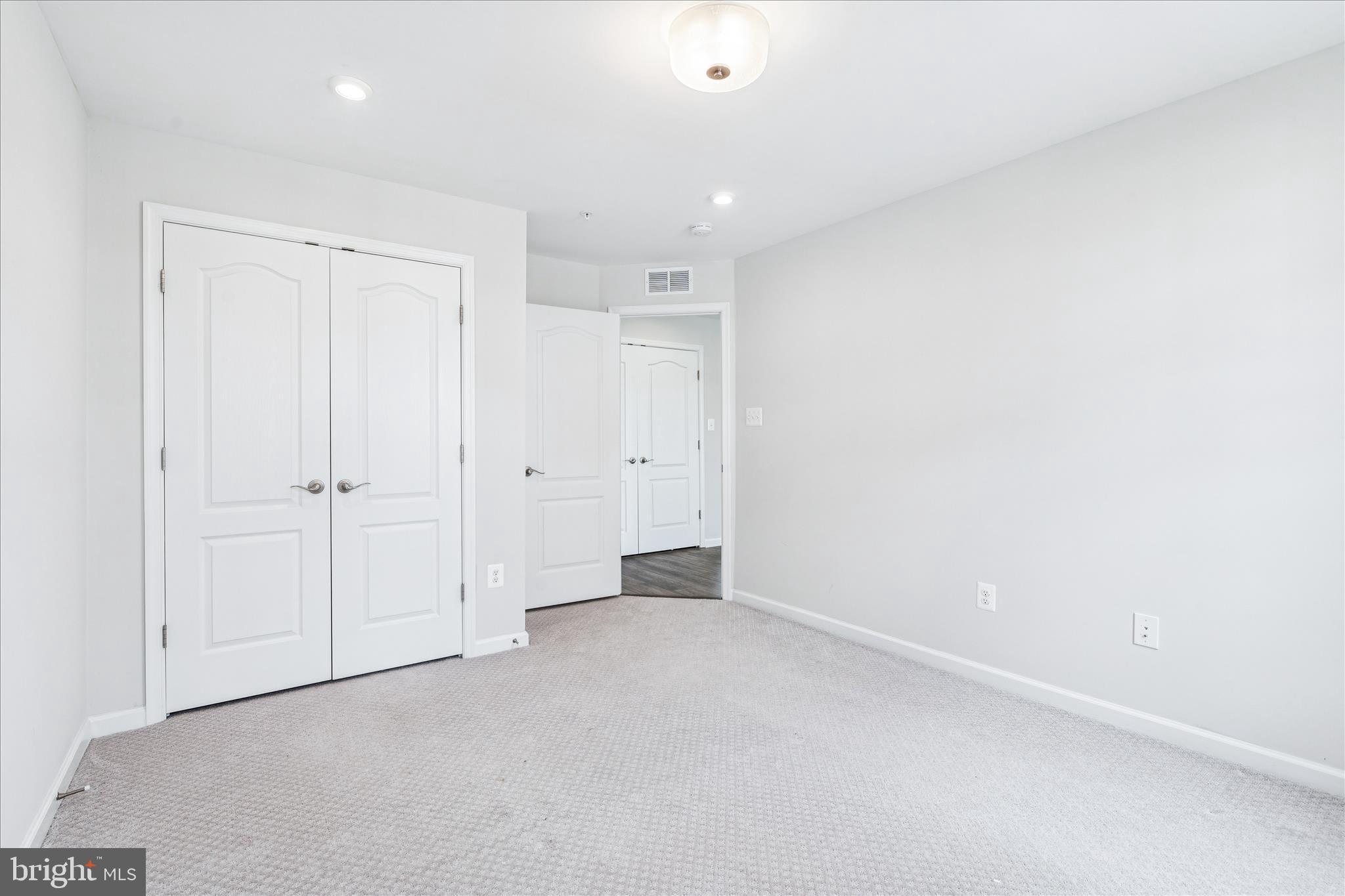 9454 James Macgowan Lane, Unit 447 Owings Mills, MD 21117 - Photo 23 of 41 a view of an empty room