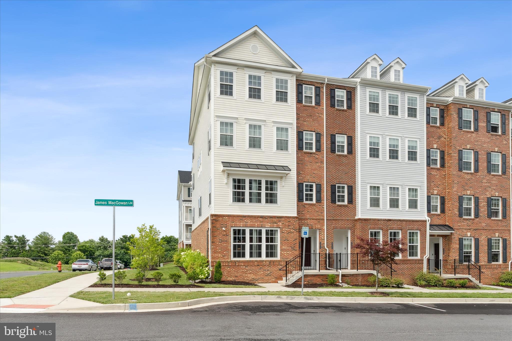9454 James Macgowan Lane, Unit 447 Owings Mills, MD 21117 - Photo 37 of 41 a front view of a building with street view