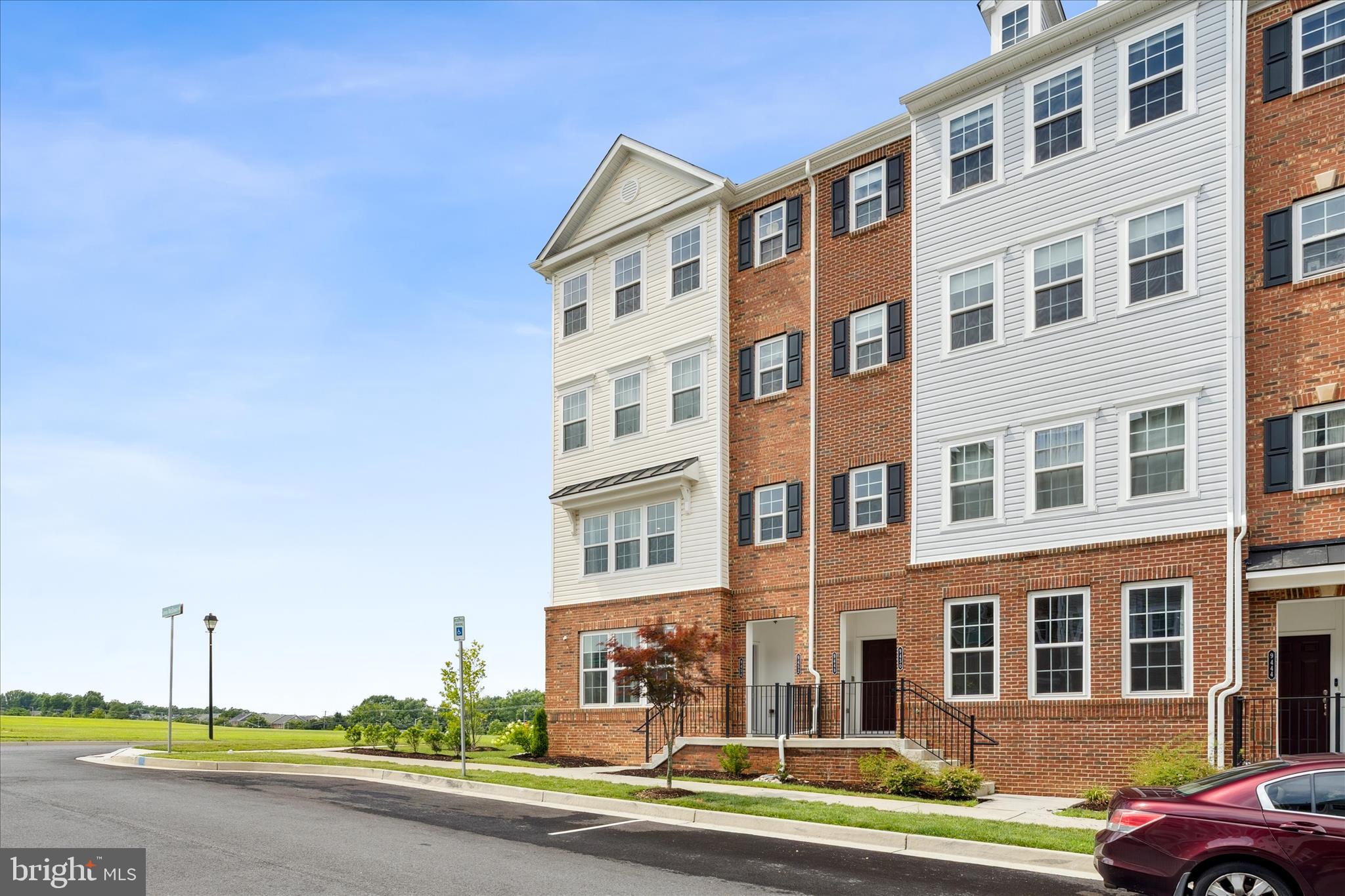 9454 James Macgowan Lane, Unit 447 Owings Mills, MD 21117 - Photo 38 of 41 a front view of a building with lot of windows