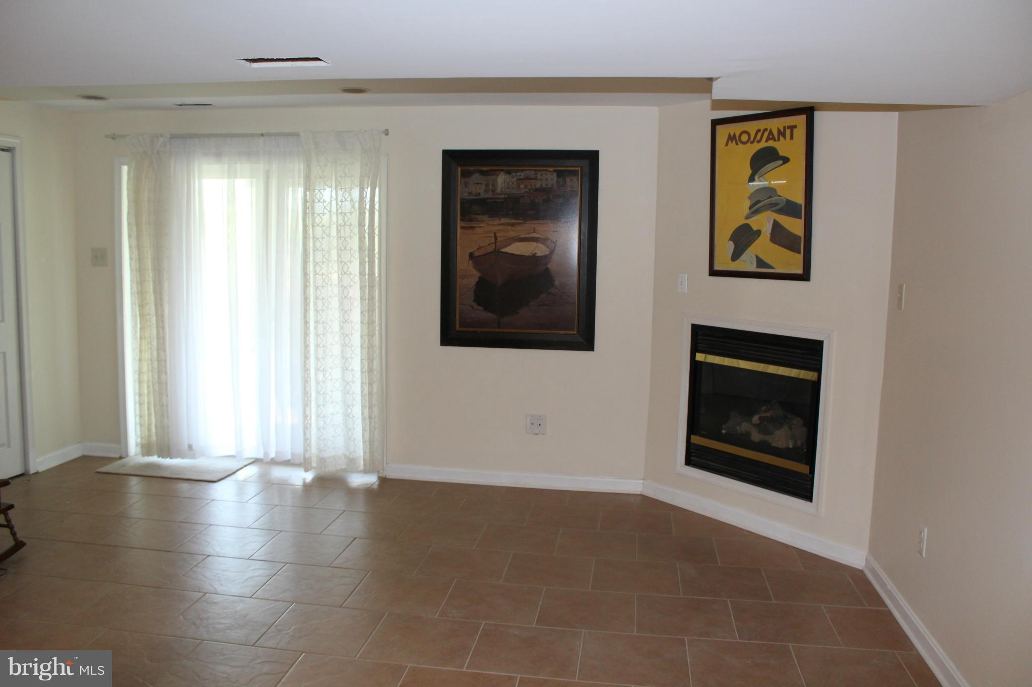 6204 Patuxent Quarter Road Hanover, MD 21076 - Photo 28 of 30 Family Room w/gas fireplace