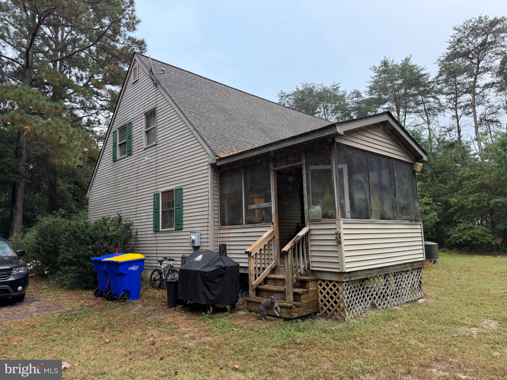 30772 River Road Laurel, DE 19956 - Photo 18 of 21 a front view of a house with garden