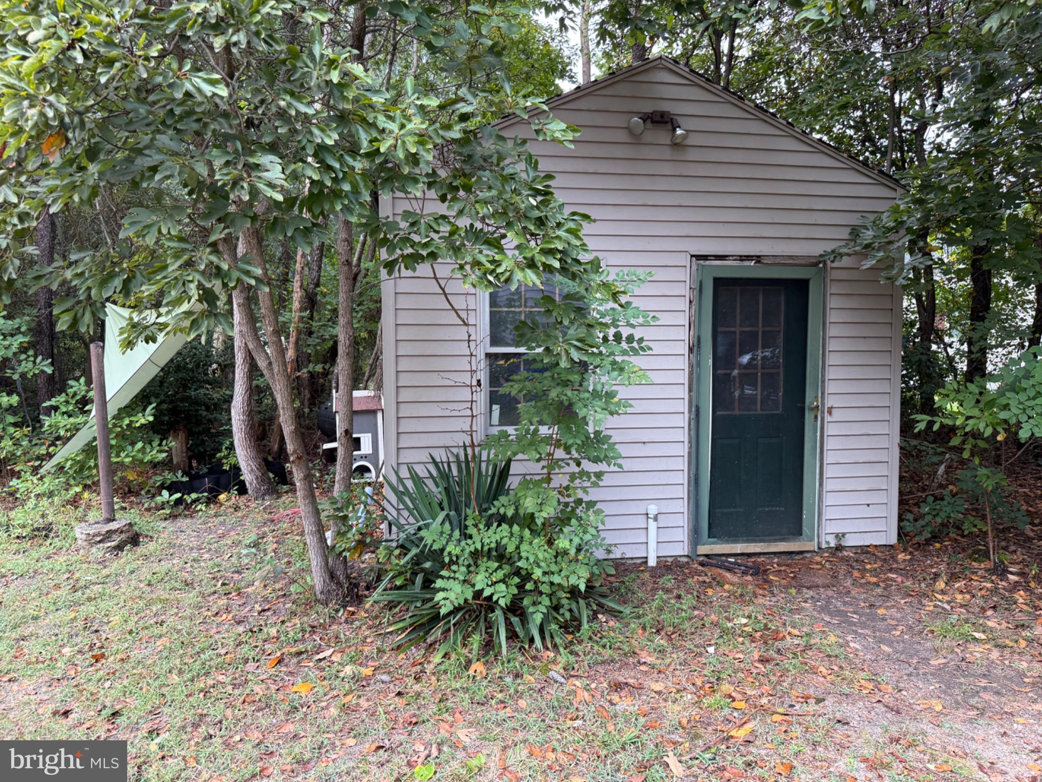 30772 River Road Laurel, DE 19956 - Photo 19 of 21 a front view of a house with garden