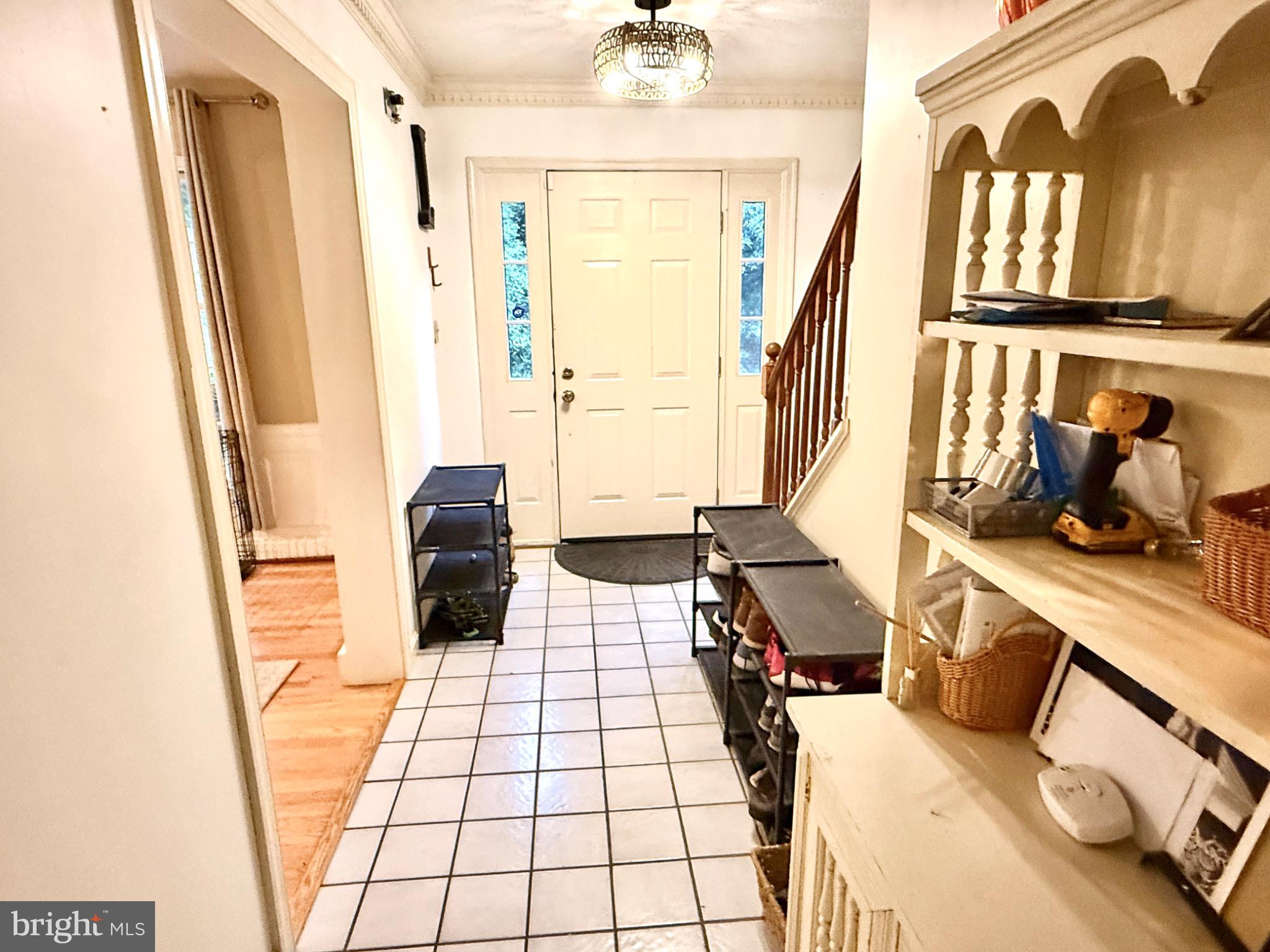30772 River Road Laurel, DE 19956 - Photo 6 of 21 a living room with furniture and a floor to ceiling window
