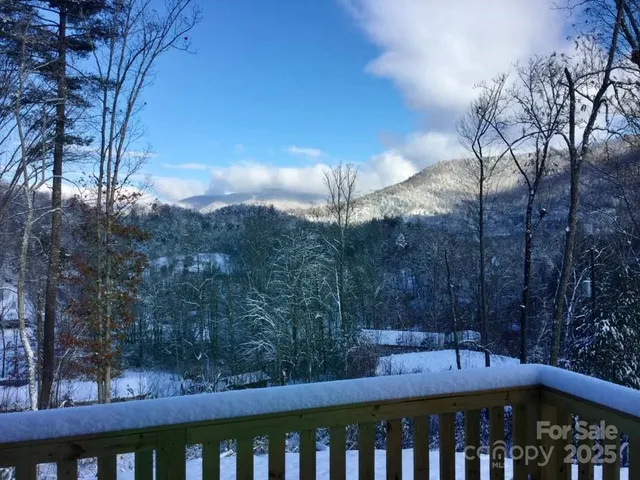 a view of a balcony with an outdoor space