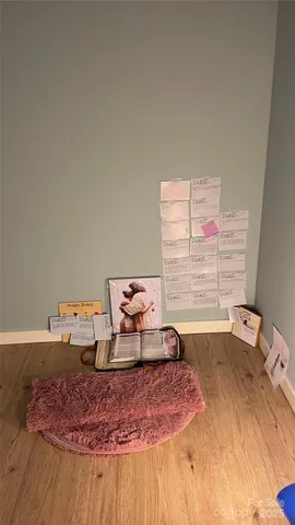 a bathroom with a granite countertop sink a shower and a mirror