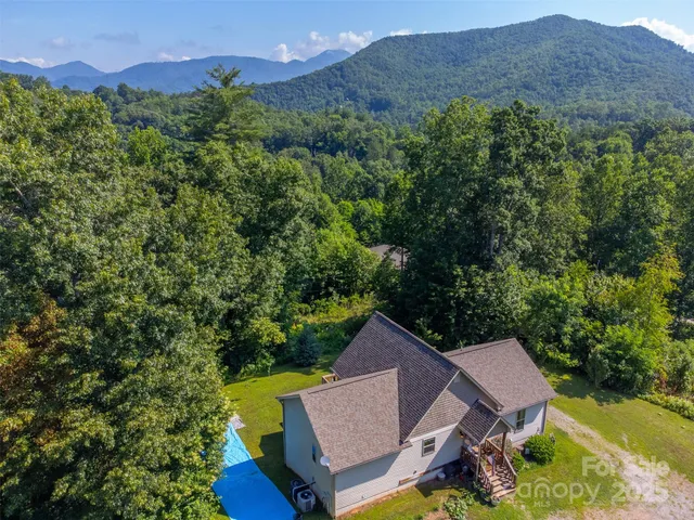 a aerial view of a house with a garden