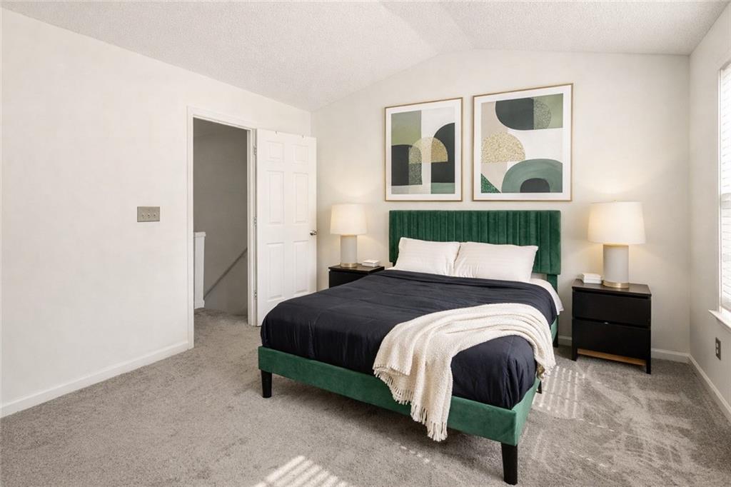 5750 Reps Trace Norcross, GA 30071 - Photo 11 of 18 a bedroom with a bed and wall painting
