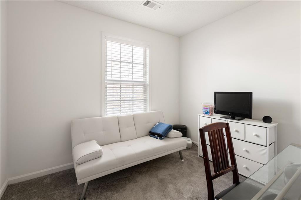 5750 Reps Trace Norcross, GA 30071 - Photo 15 of 18 a living room with furniture and a flat screen tv