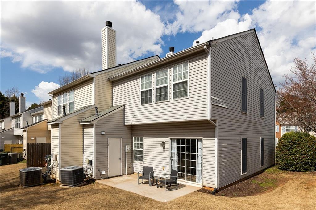 5750 Reps Trace Norcross, GA 30071 - Photo 17 of 18 a front view of a house with yard