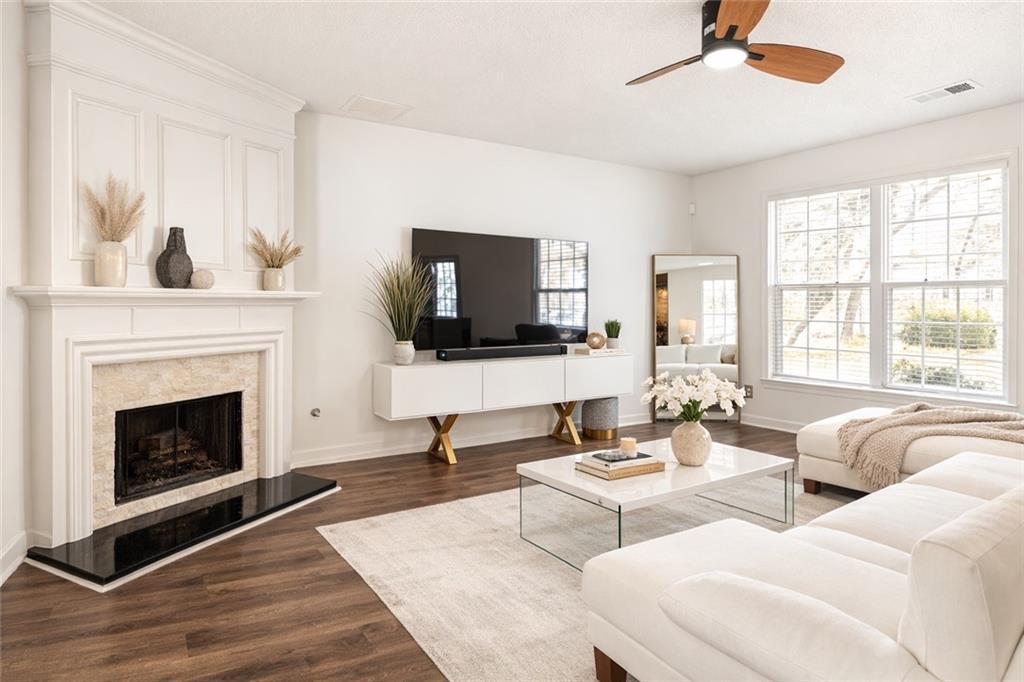 5750 Reps Trace Norcross, GA 30071 - Photo 4 of 18 a living room with furniture a fireplace and a flat screen tv