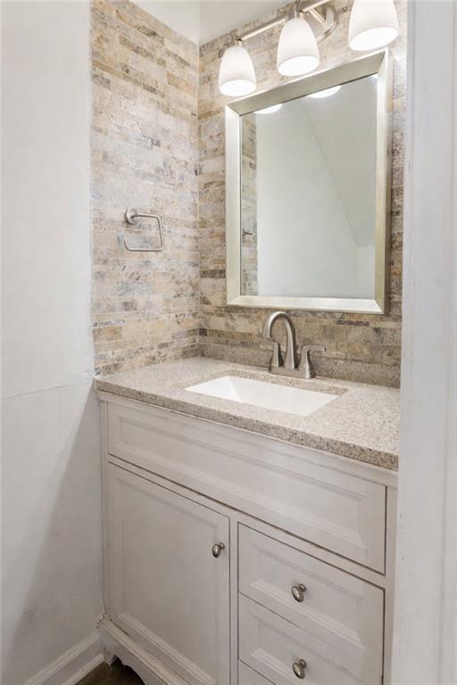 5750 Reps Trace Norcross, GA 30071 - Photo 10 of 18 a bathroom with a granite countertop sink and a mirror