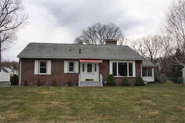 656 Shaker Road Longmeadow, MA 01106 - Photo 1 of 1 a front view of a house with garden