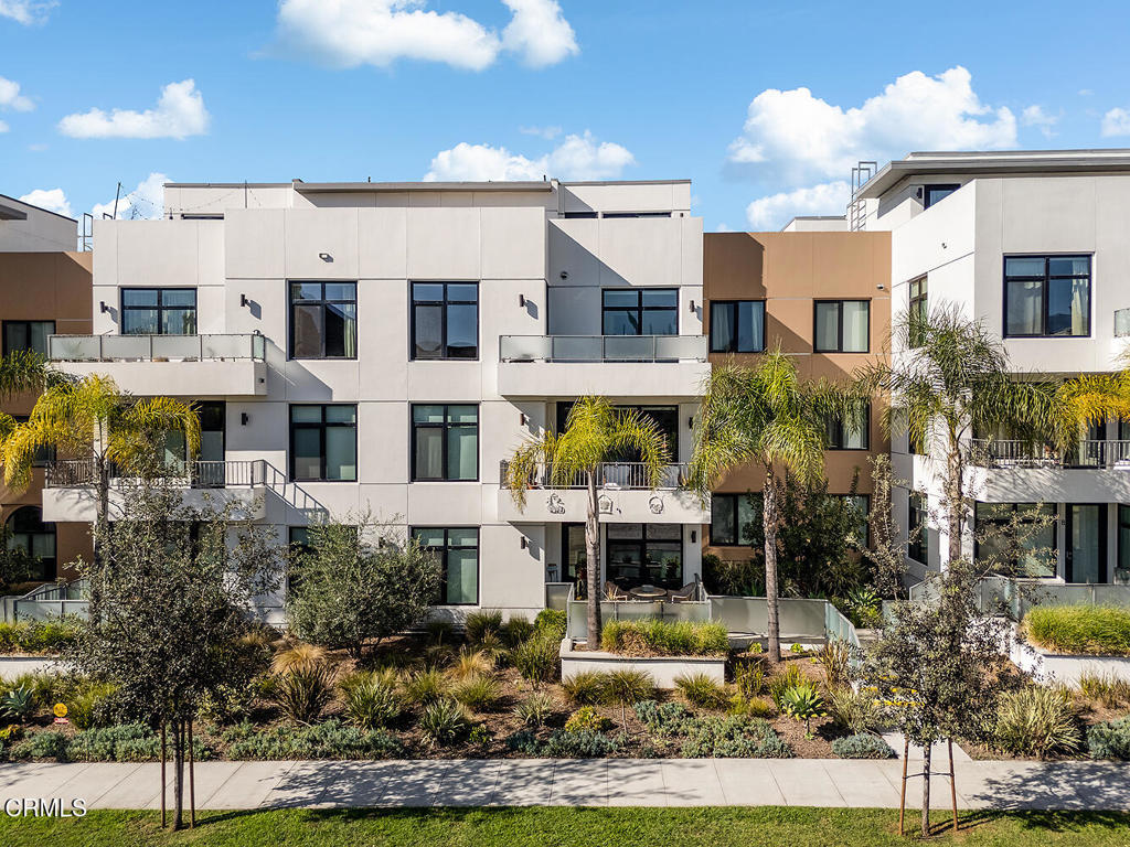 399 East Del Mar Boulevard, Unit 308 Pasadena, CA 91101 - Photo 1 of 32 a view of multiple house with a yard and potted plants