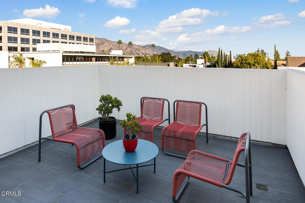 399 East Del Mar Boulevard, Unit 308 Pasadena, CA 91101 - Photo 23 of 32 a view of a chairs in a terrace