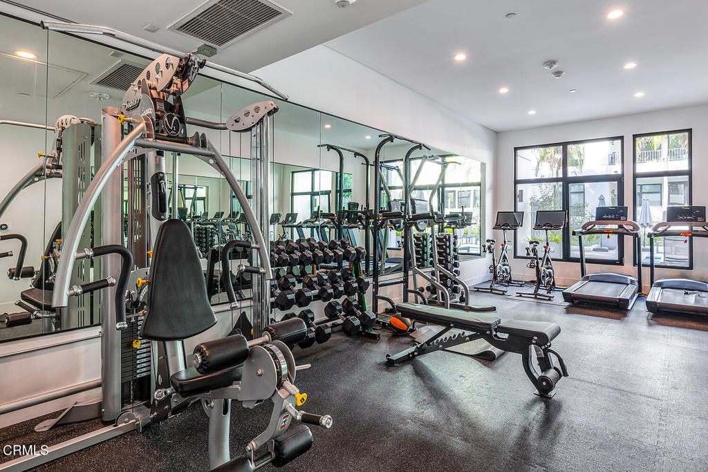 399 East Del Mar Boulevard, Unit 308 Pasadena, CA 91101 - Photo 30 of 32 a view of a room with gym equipment