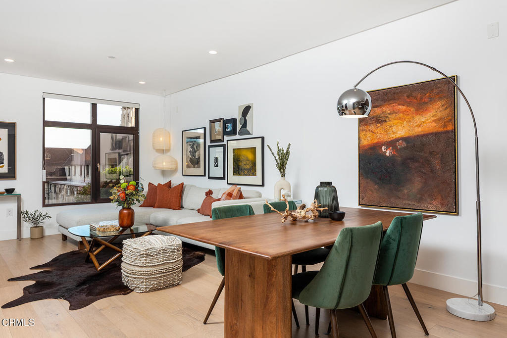 399 East Del Mar Boulevard, Unit 308 Pasadena, CA 91101 - Photo 6 of 32 a living room with furniture and a window