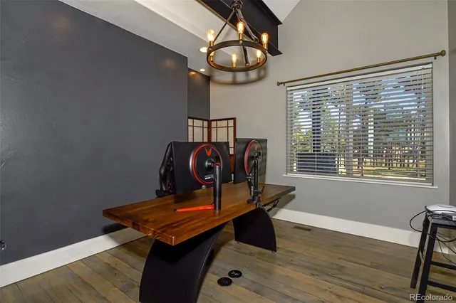 a room with furniture and wooden floor