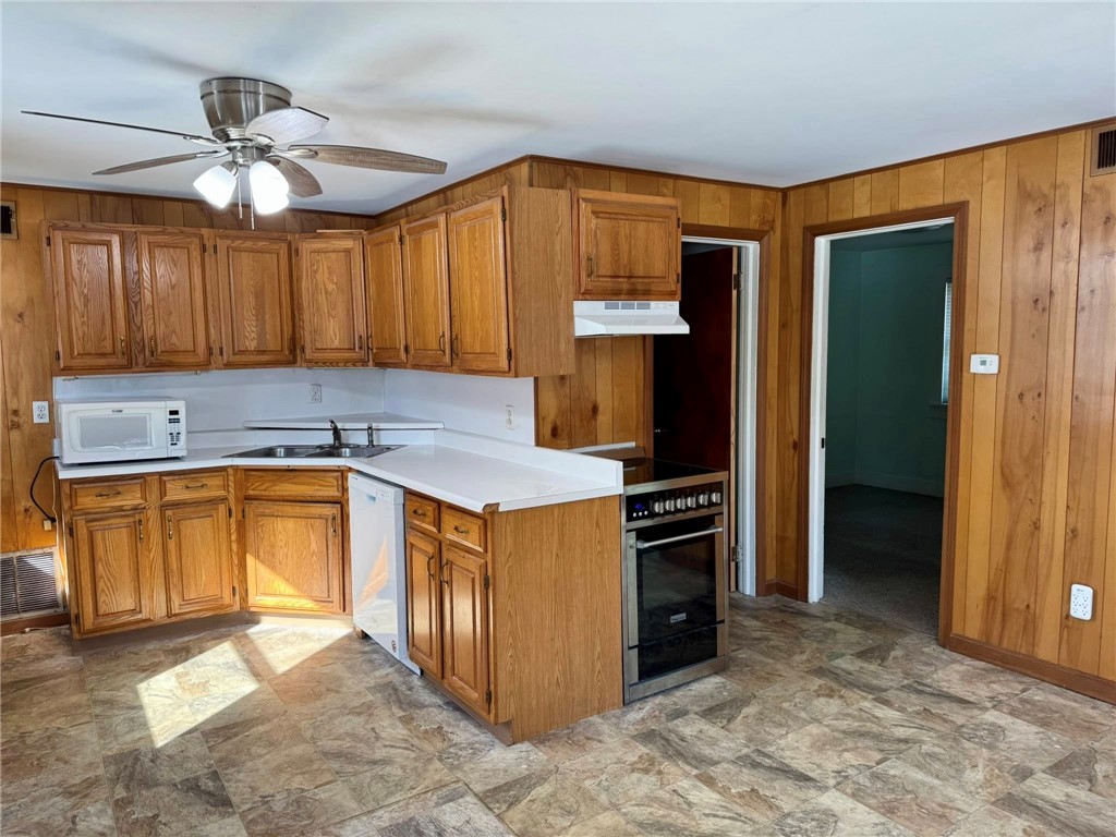 46 Salt Pond Way Westerly, RI 02891 - Photo 14 of 26 View of kitchen to the left, bathroom door, then bedroom number two