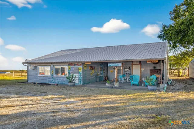 a view of a chairs in a patio