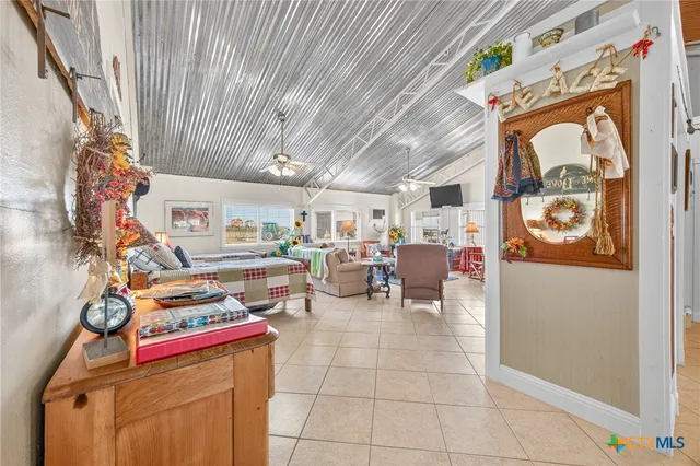 a dining table with chairs and window