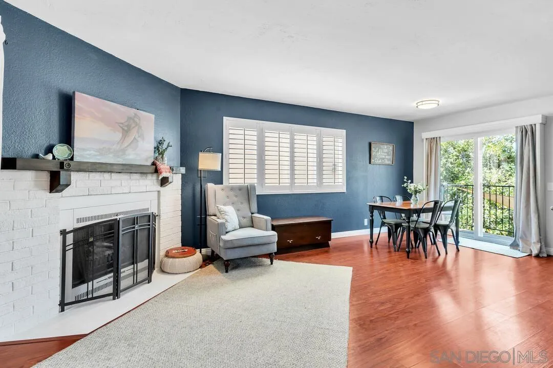 1635 Portola Avenue Spring Valley, CA 91977 - Photo 11 of 54 a living room with furniture and a fireplace