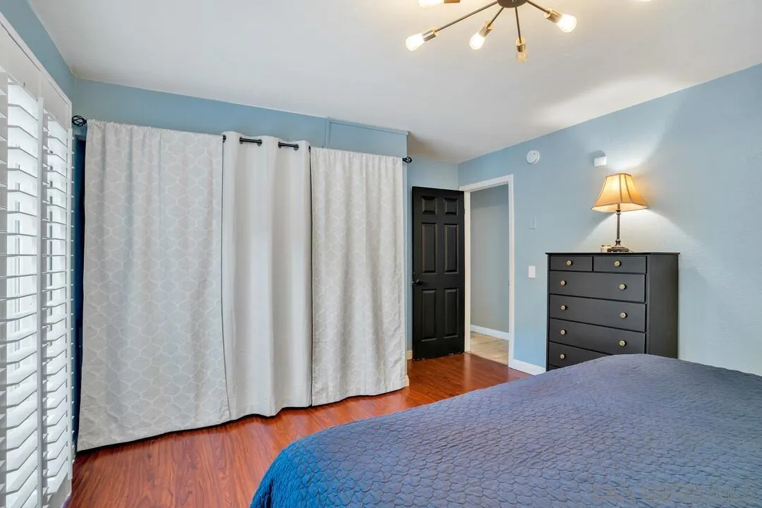 1635 Portola Avenue Spring Valley, CA 91977 - Photo 26 of 54 a bedroom with a bed and a dresser